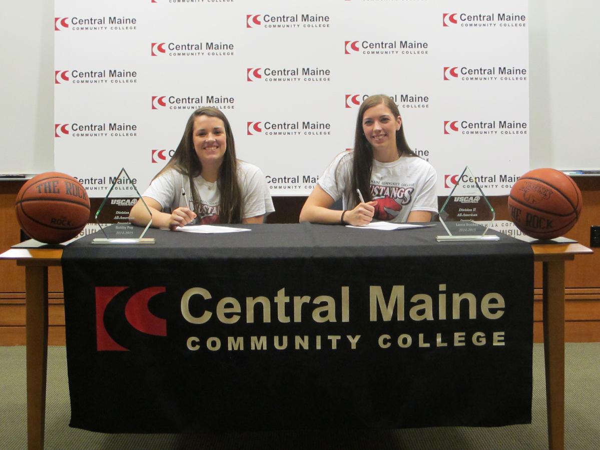 Two Lady Mustangs sign scholarships