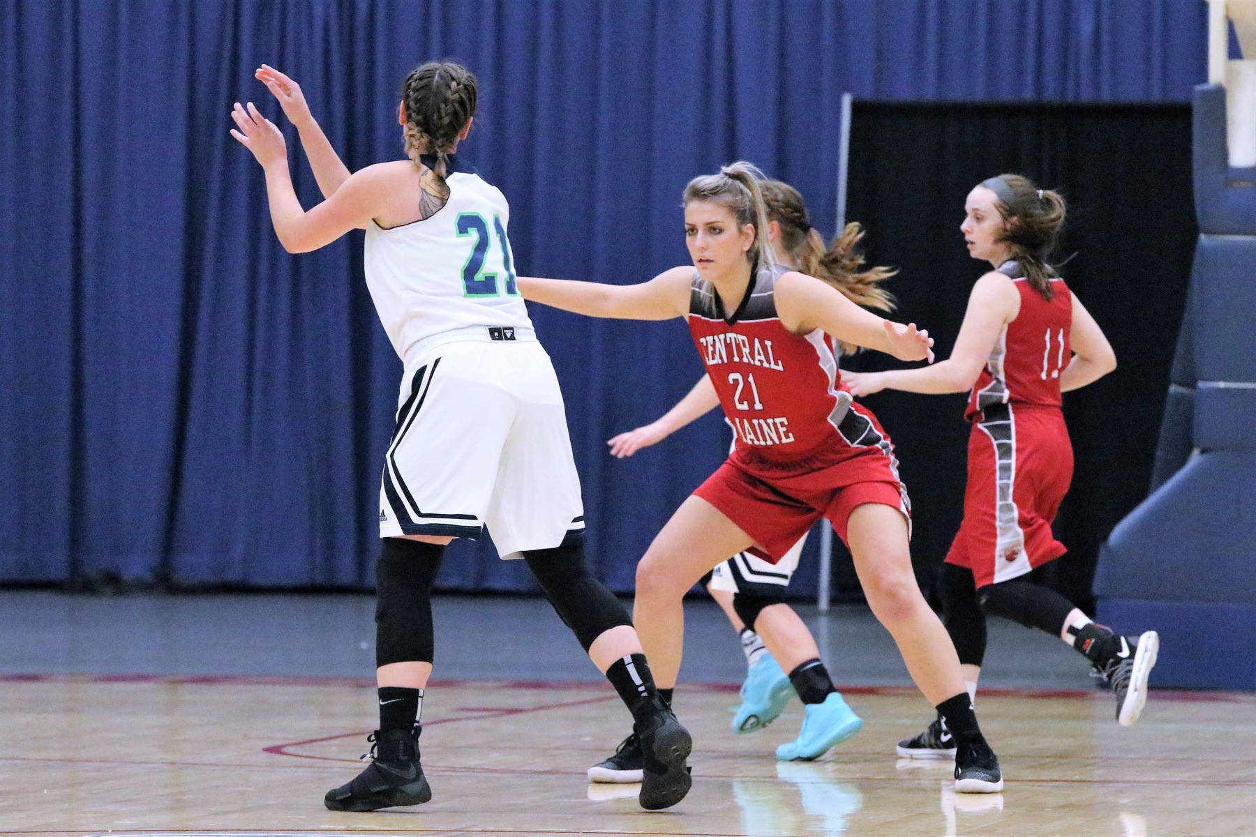 Rusty Lady Mustangs use late surge to beat CCRI